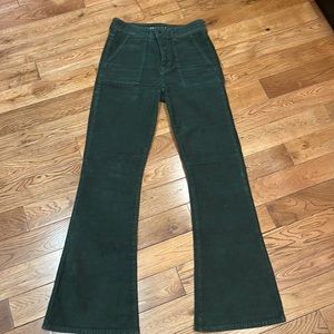 Green corduroy flared pants